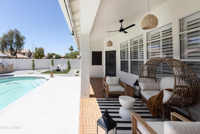 802 N Lisbon Dr, Chandler, AZ 85226 - fenced backyard featuring a patio area, ceiling fan, and an outdoor hangout area