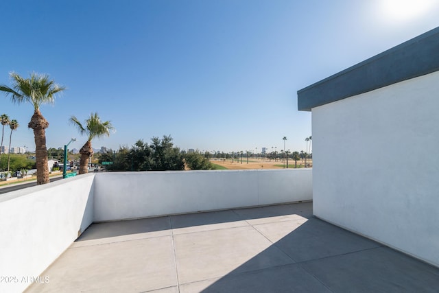 view of patio / terrace with a balcony