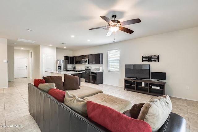 1718 W Cameron Blvd, Coolidge, AZ 85128 - living area with light tile patterned floors, a ceiling fan, recessed lighting, and baseboards