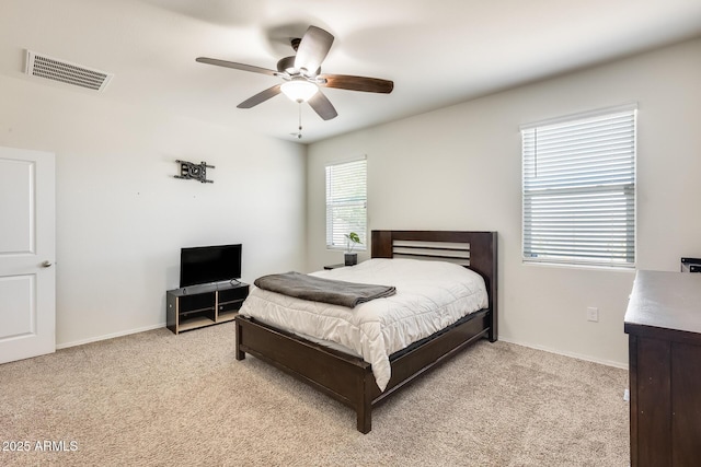 1718 W Cameron Blvd, Coolidge, AZ 85128 - bedroom featuring light carpet, a ceiling fan, and baseboards
