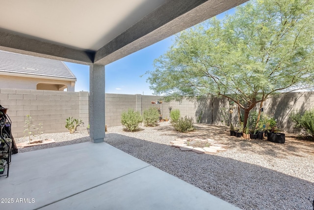 1718 W Cameron Blvd, Coolidge, AZ 85128 - fenced backyard with a patio area