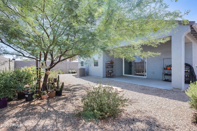 1718 W Cameron Blvd, Coolidge, AZ 85128 - view of property exterior featuring a patio, stucco siding, and central air condition unit