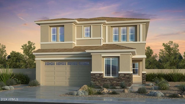 view of front of house with concrete driveway, stone siding, and stucco siding