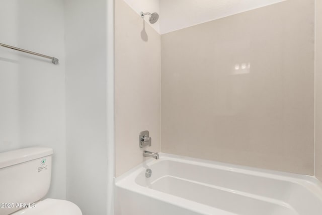 bathroom with toilet and shower / tub combination