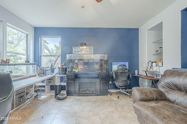 tiled home office with ceiling fan