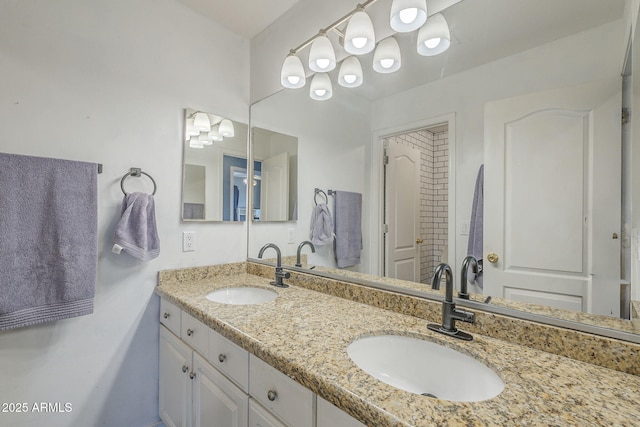 full bathroom featuring double vanity