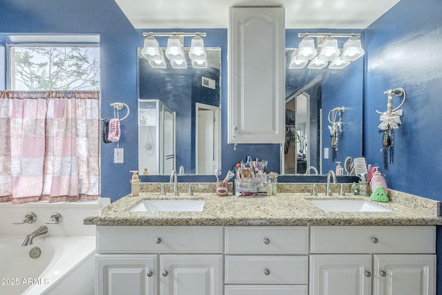full bathroom with a garden tub and double vanity