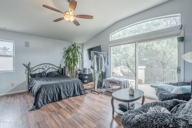 bedroom with lofted ceiling, wood finished floors, access to exterior, ceiling fan, and baseboards