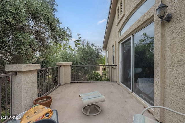 view of patio / terrace with a balcony