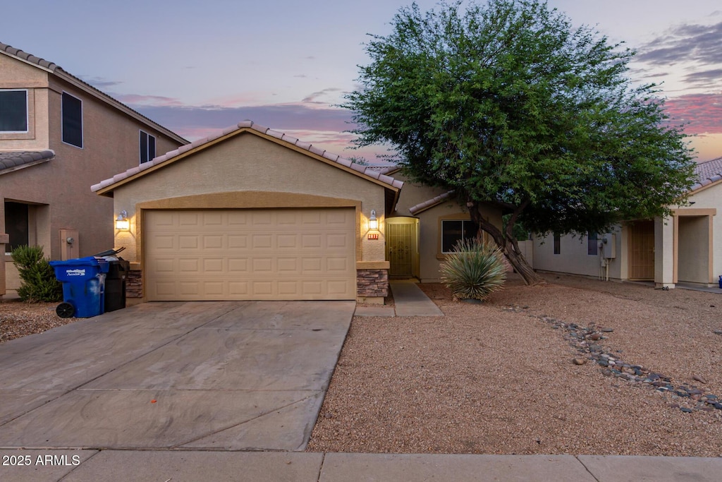 view of front of house with a garage