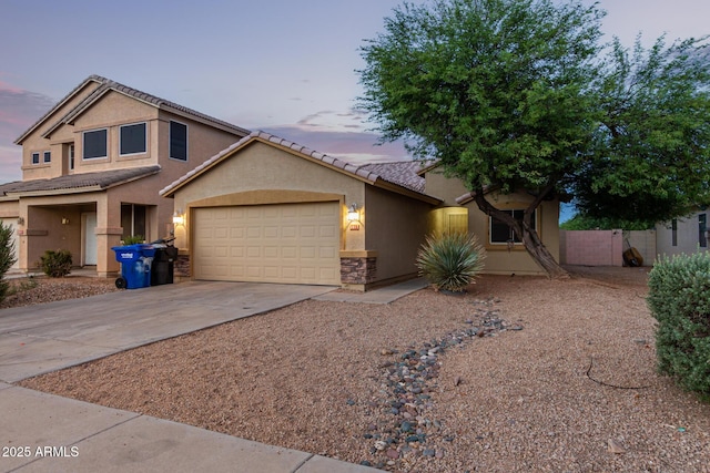 view of front of property with a garage