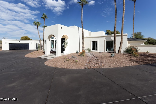 view of front of property featuring a garage