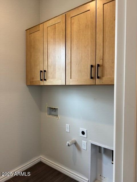 10039 W Verde Ln, Avondale, AZ 85392 - laundry area featuring dark wood-type flooring, cabinet space, baseboards, hookup for an electric dryer, and hookup for a washing machine