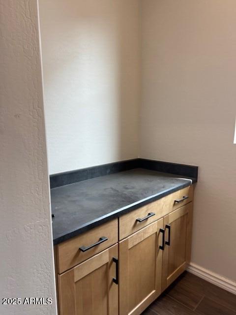 10039 W Verde Ln, Avondale, AZ 85392 - interior details with baseboards and wood finished floors