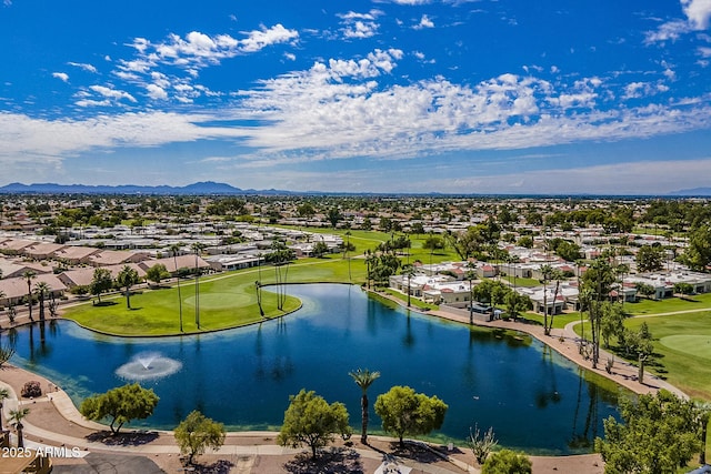 birds eye view of property with a residential view and a water and mountain view