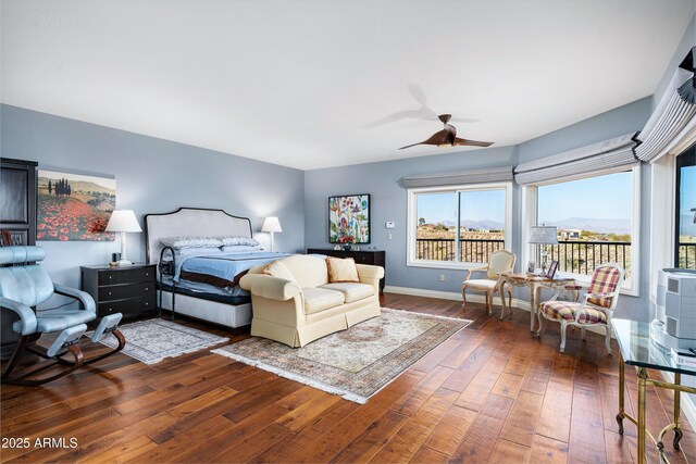 bedroom with access to outside, baseboards, ceiling fan, and hardwood / wood-style floors