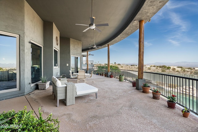 view of patio with a ceiling fan