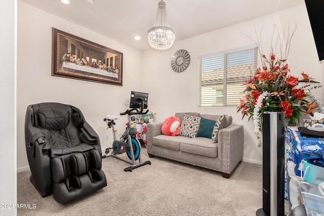 carpeted living room with a chandelier