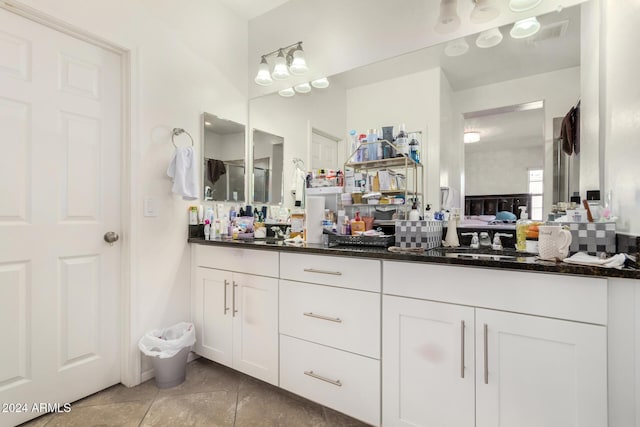 bathroom with vanity and tile patterned floors