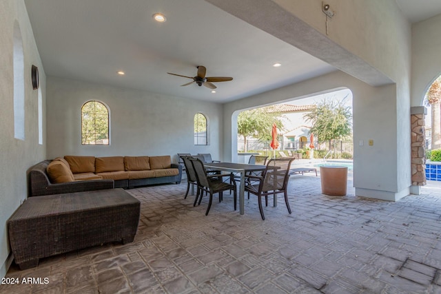 view of patio / terrace featuring an outdoor living space and ceiling fan