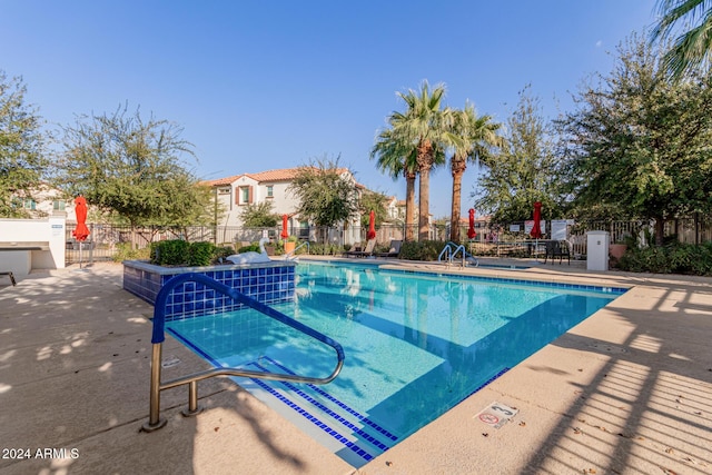 view of pool featuring a patio area