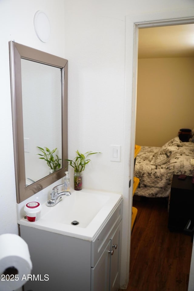 2302 E Sheraton Ln, Phoenix, AZ 85040 - bathroom with vanity and wood finished floors