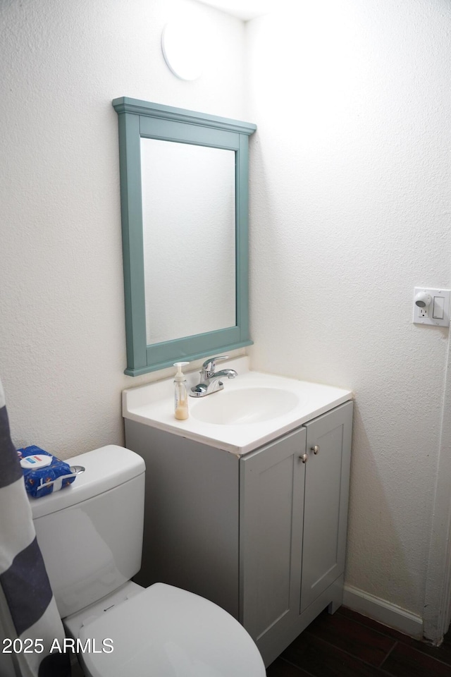 2302 E Sheraton Ln, Phoenix, AZ 85040 - bathroom with vanity and wood finished floors