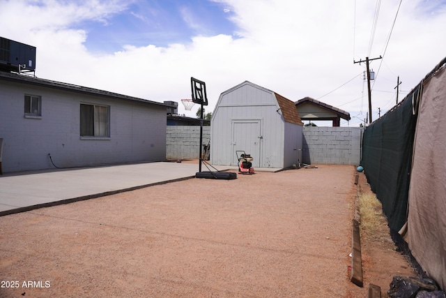 2302 E Sheraton Ln, Phoenix, AZ 85040 - fenced backyard featuring a shed and a patio area
