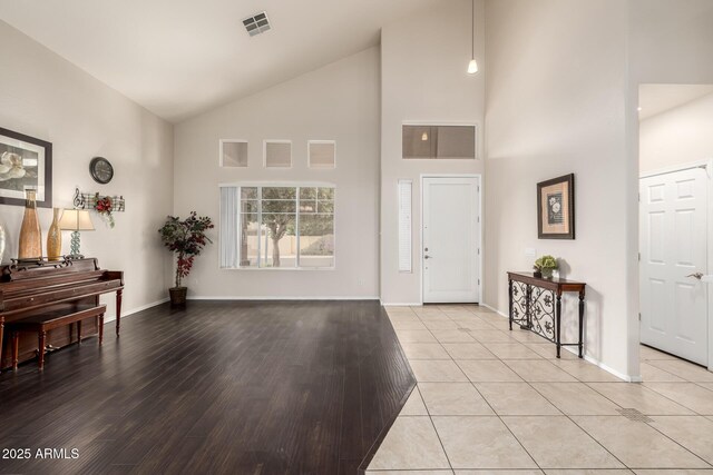 6971 W El Cortez Pl, Peoria, AZ 85383 - entryway with high vaulted ceiling and baseboards