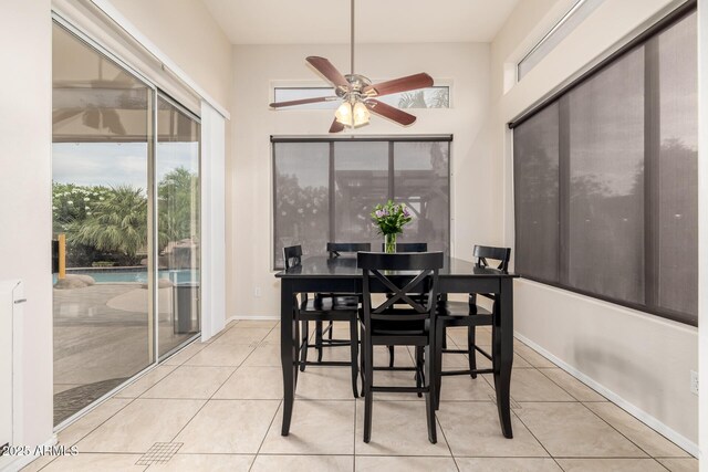 6971 W El Cortez Pl, Peoria, AZ 85383 - dining room featuring ceiling fan, tile patterned flooring, and baseboards