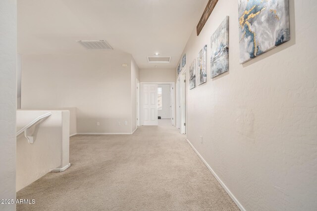6971 W El Cortez Pl, Peoria, AZ 85383 - hall featuring carpet, baseboards, and an upstairs landing