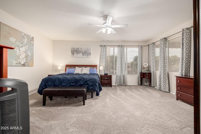 6971 W El Cortez Pl, Peoria, AZ 85383 - carpeted bedroom featuring baseboards and a ceiling fan