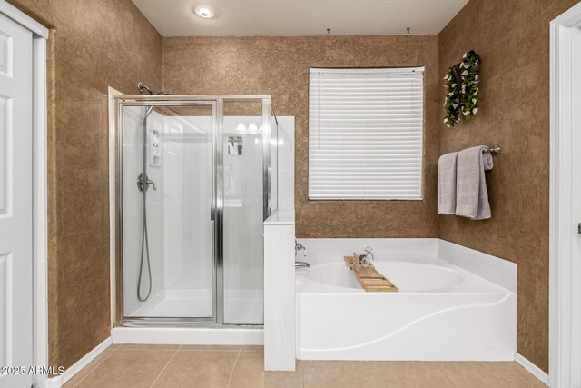 6971 W El Cortez Pl, Peoria, AZ 85383 - full bath with a stall shower, tile patterned floors, and a garden tub
