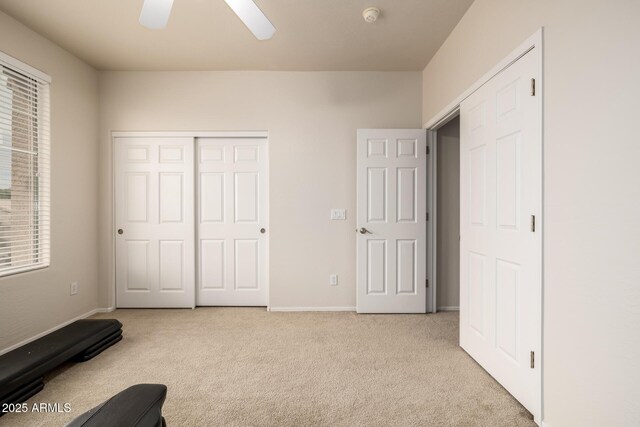 6971 W El Cortez Pl, Peoria, AZ 85383 - carpeted bedroom with a closet, baseboards, and a ceiling fan