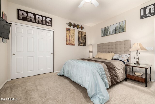6971 W El Cortez Pl, Peoria, AZ 85383 - carpeted bedroom featuring baseboards, a ceiling fan, and a closet