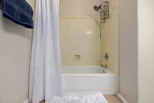6971 W El Cortez Pl, Peoria, AZ 85383 - full bathroom featuring shower / bath combination with curtain, tile patterned floors, and baseboards