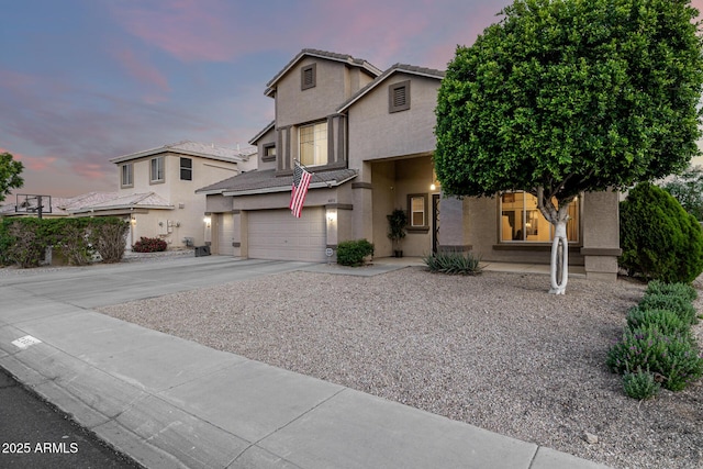 6971 W El Cortez Pl, Peoria, AZ 85383 - traditional-style house featuring an attached garage, driveway, stucco siding, and a tiled roof