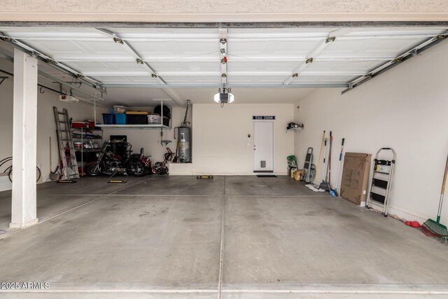 6971 W El Cortez Pl, Peoria, AZ 85383 - garage with gas water heater and a garage door opener