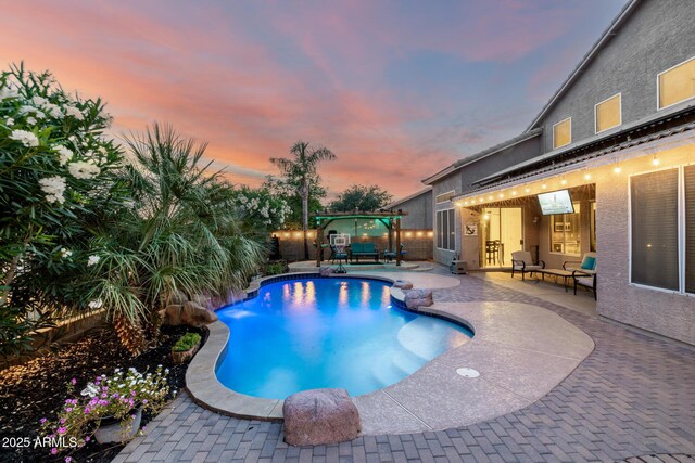 6971 W El Cortez Pl, Peoria, AZ 85383 - view of swimming pool with a patio area and a fenced backyard