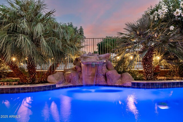 6971 W El Cortez Pl, Peoria, AZ 85383 - view of pool at dusk