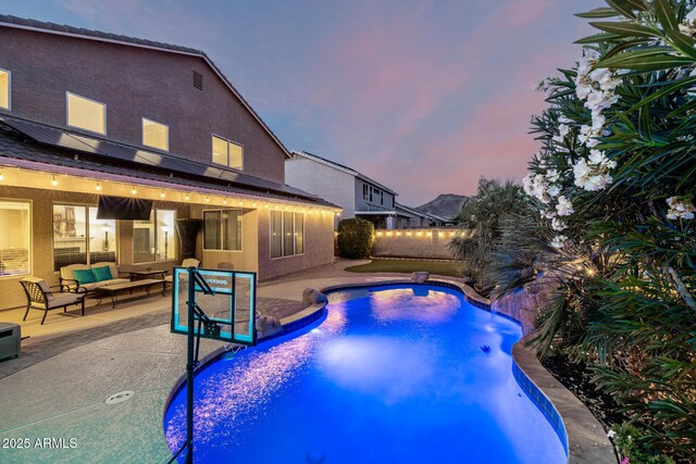 6971 W El Cortez Pl, Peoria, AZ 85383 - view of pool with a patio, a fenced backyard, and an outdoor hangout area