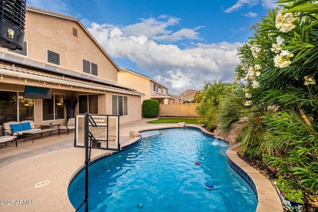 6971 W El Cortez Pl, Peoria, AZ 85383 - view of swimming pool with a patio and a fenced backyard