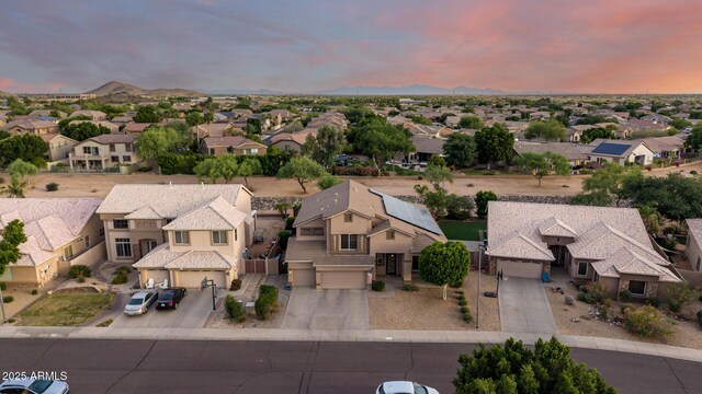 6971 W El Cortez Pl, Peoria, AZ 85383 - aerial view at dusk of a residential view
