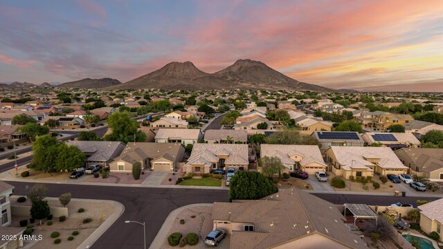 6971 W El Cortez Pl, Peoria, AZ 85383 - aerial view of residential area featuring a mountain backdrop