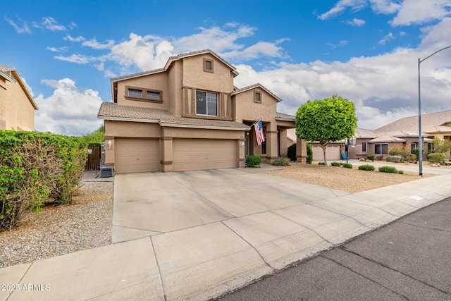 6971 W El Cortez Pl, Peoria, AZ 85383 - view of front of property featuring stucco siding, an attached garage, a tiled roof, a gate, and driveway