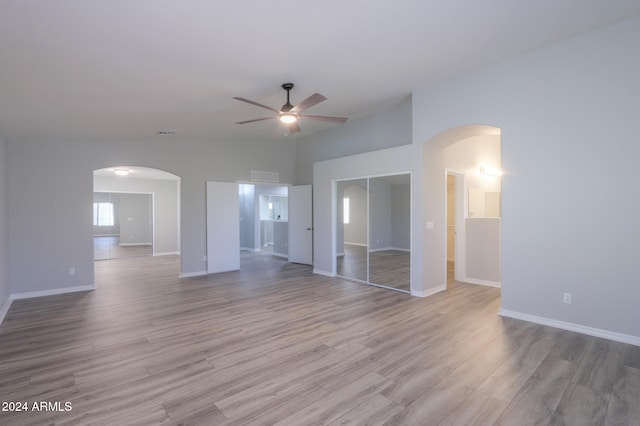 interior space with light wood-type flooring and ceiling fan