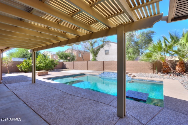 view of pool with a pergola and a patio area