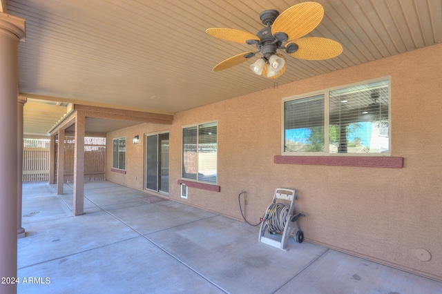 view of patio featuring ceiling fan