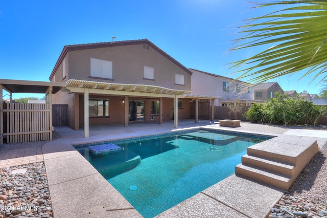 view of pool with a pergola and a patio