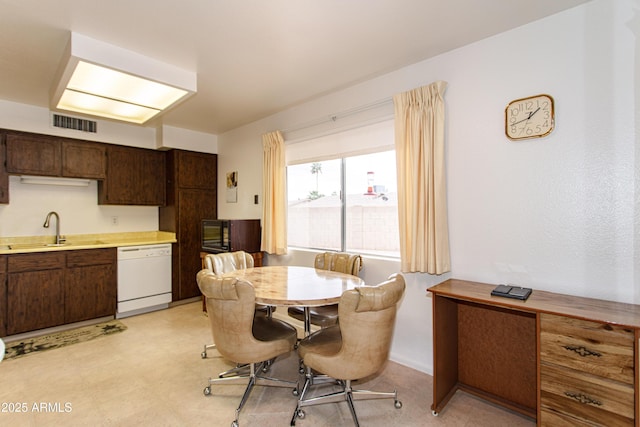 dining room with light floors and visible vents